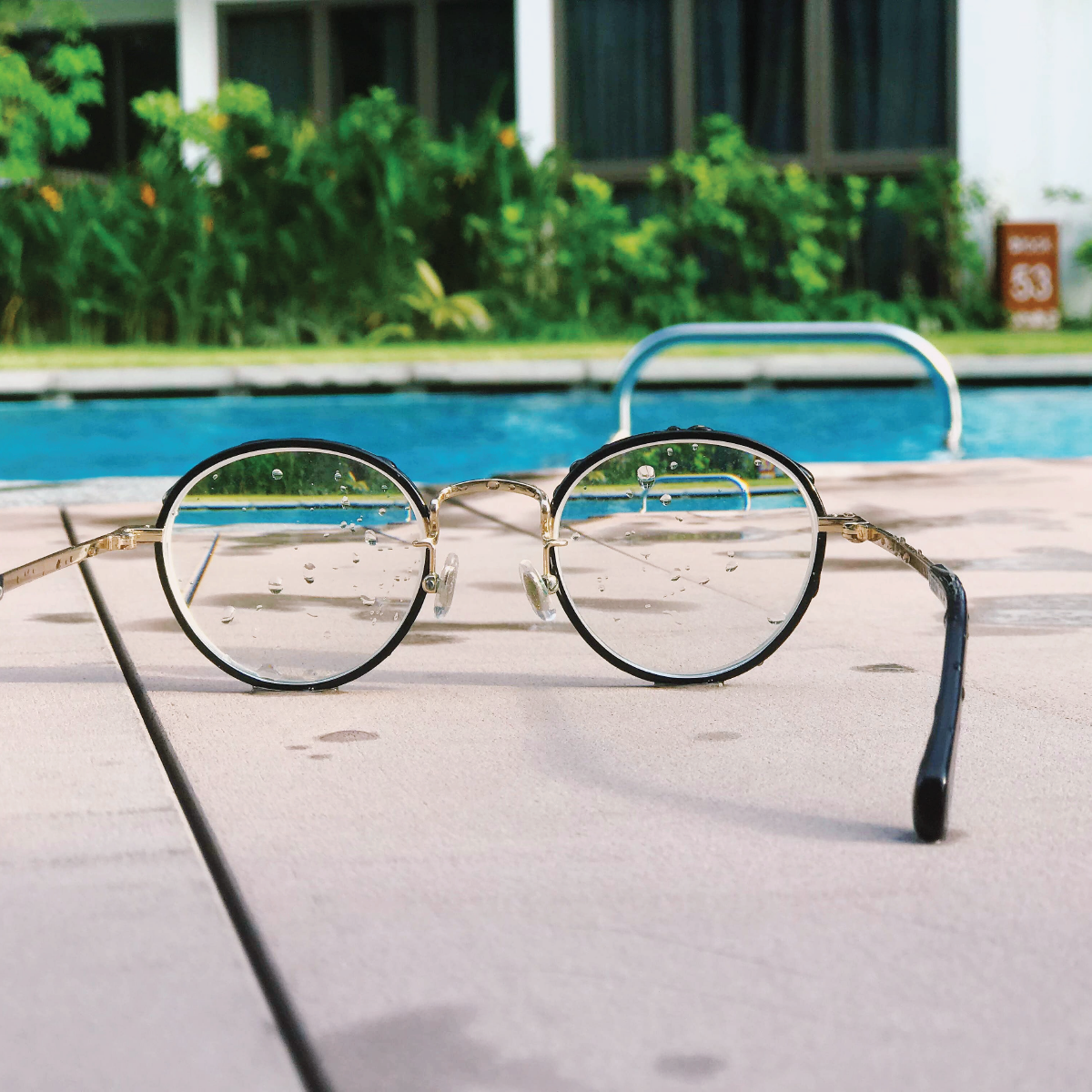 Glasses by pool